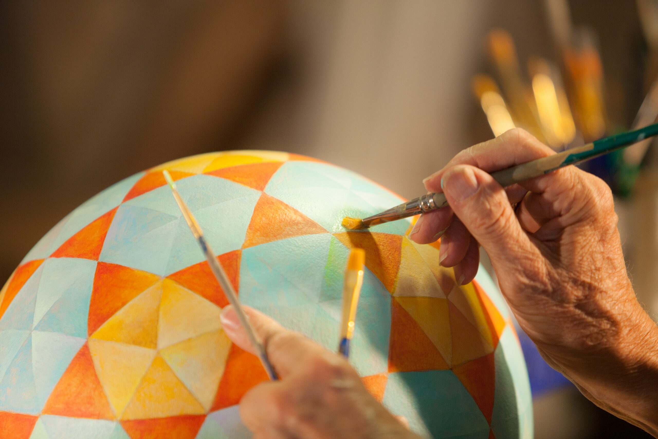 Dick Termes painting a Termesphere